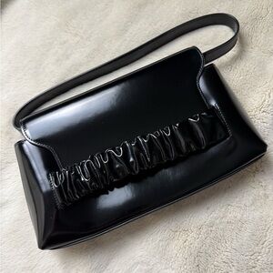 Sleek Black Shoulder Bag with Textured Design